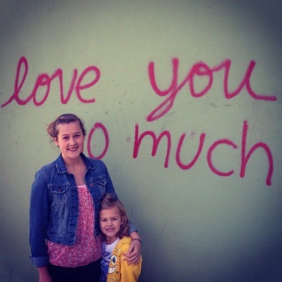 Aaron's daughters (oldest and youngest) in front of the “I Love You” wall in Austin. They both LOVE music and are an inspiration to Aaron. Photo: Aaron Strout